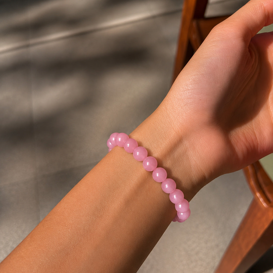 Rose Quartz Love Bracelet worn on the wrist